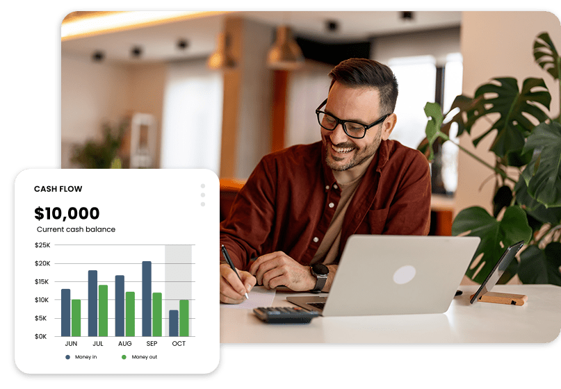 Man at desk with laptop, writing in a notebook. A chart on the side shows monthly cash flow with a current balance of $10,000.